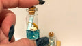 Miniature ocean theme message in a bottle