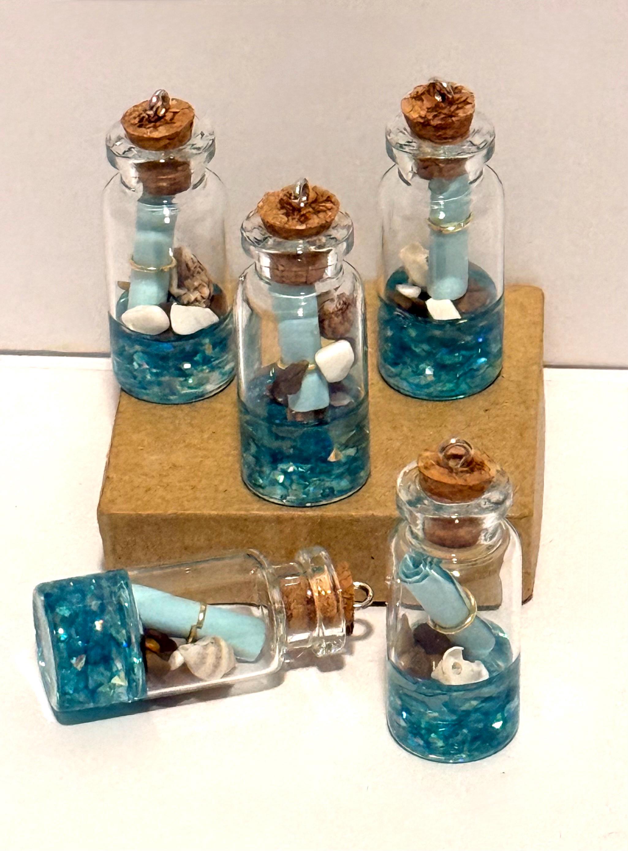 Miniature ocean theme message in a bottle