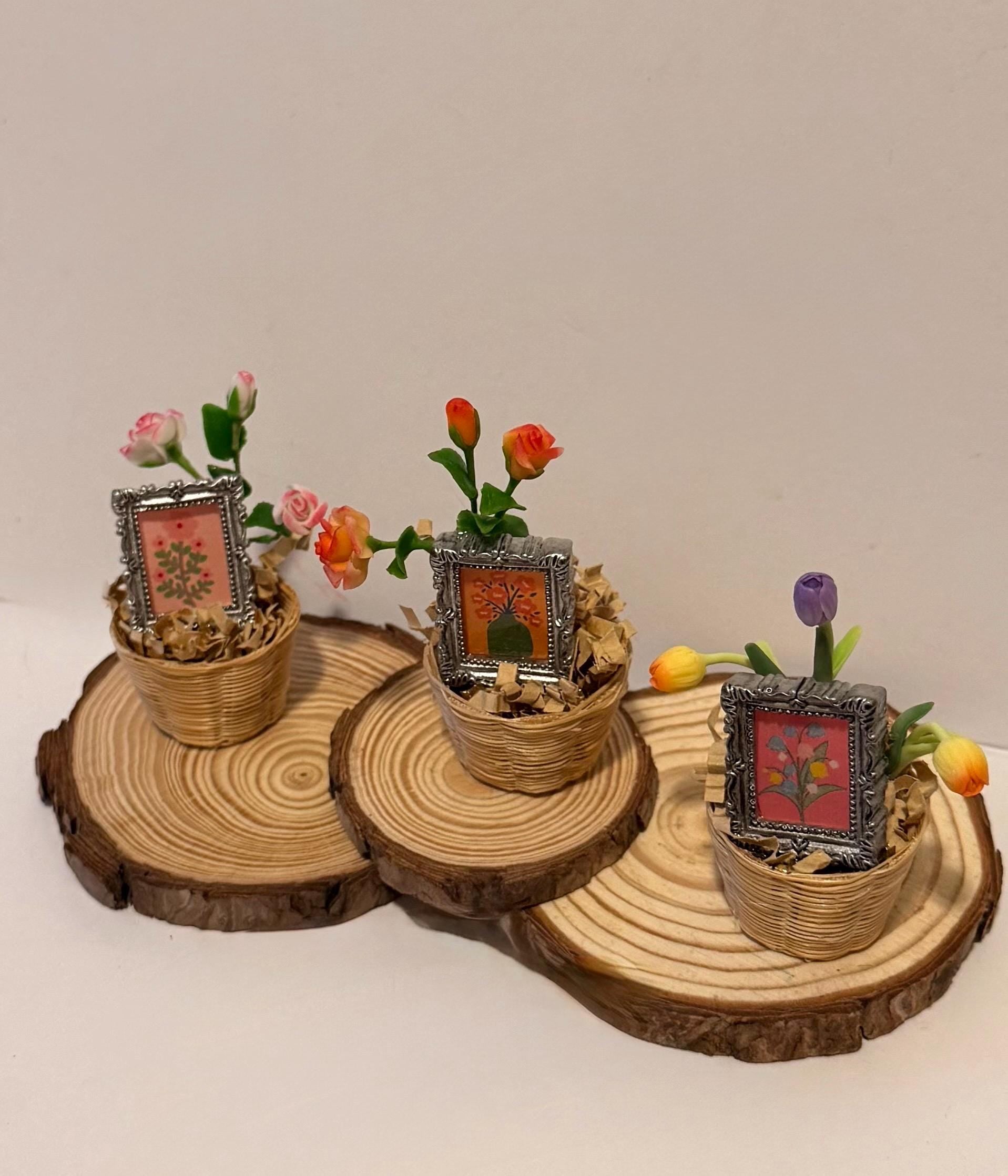 Miniature flowers and floral art frame in basket