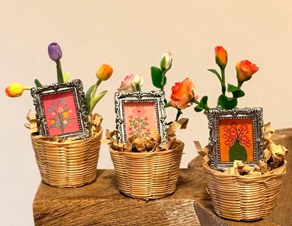 Miniature flowers and floral art frame in basket