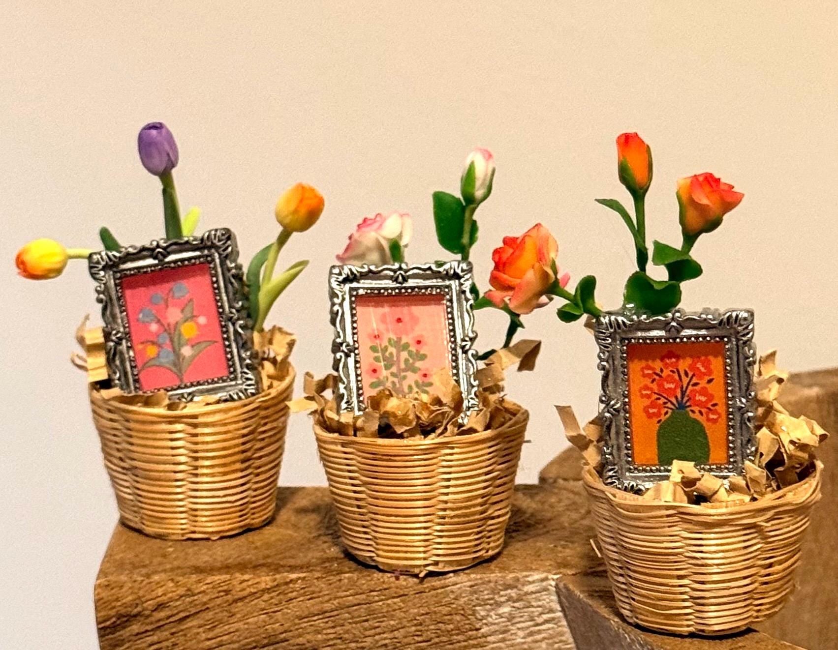 Miniature flowers and floral art frame in basket