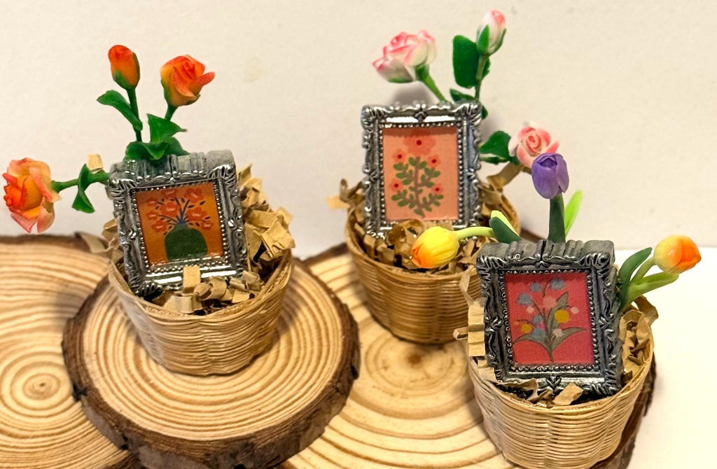 Miniature flowers and floral art frame in basket