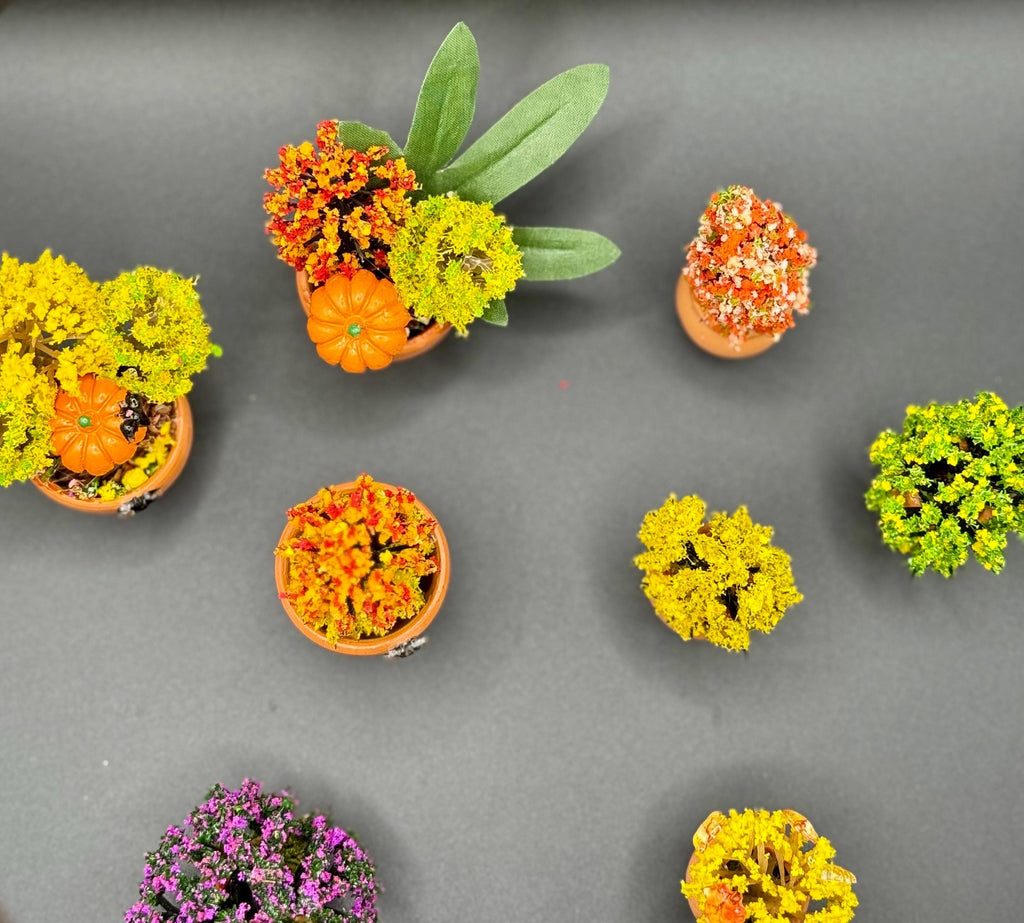 Miniature Fall Foliage Flowering Plant with pumpkins and bats