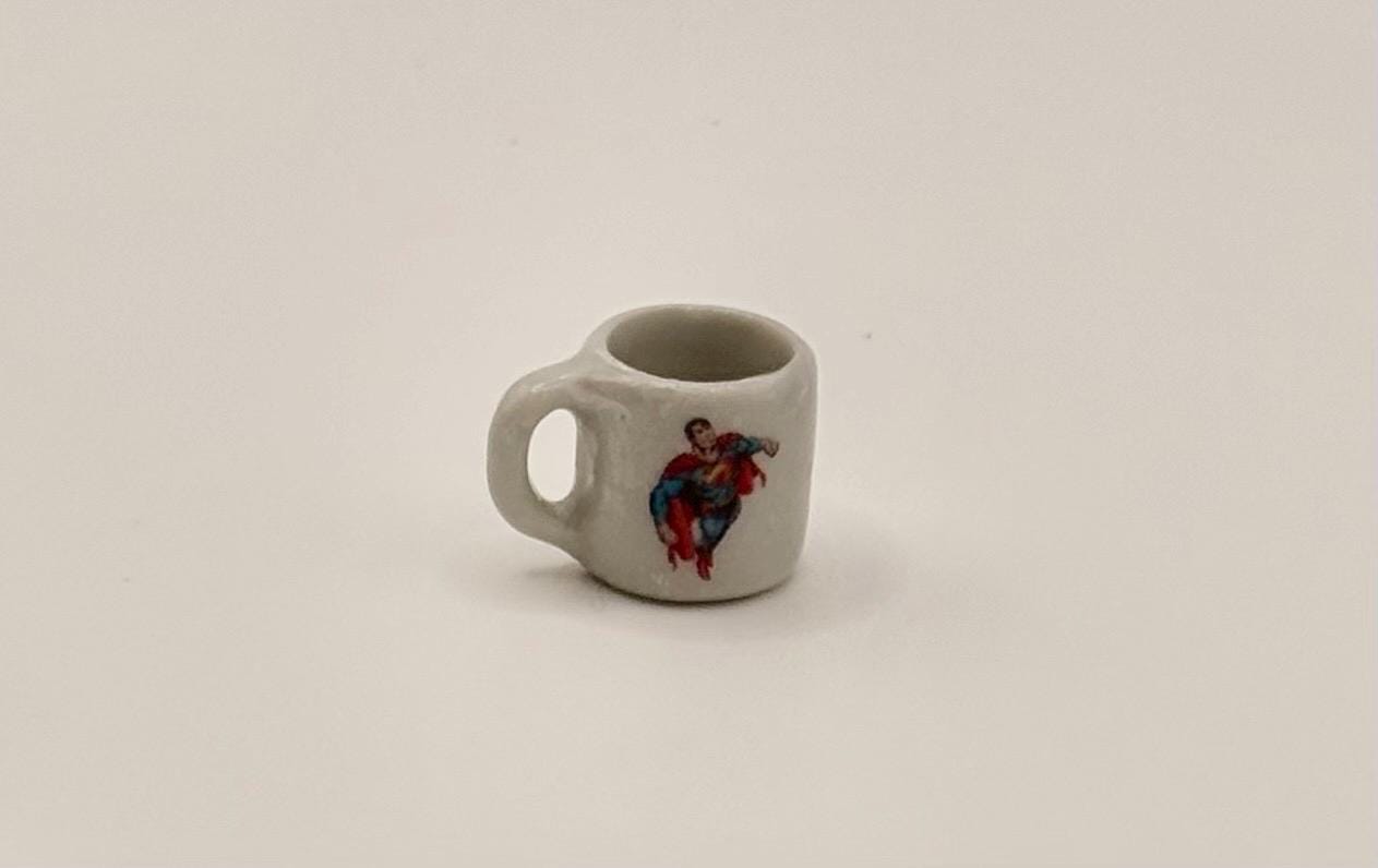 Miniature superhero coffee mugs
