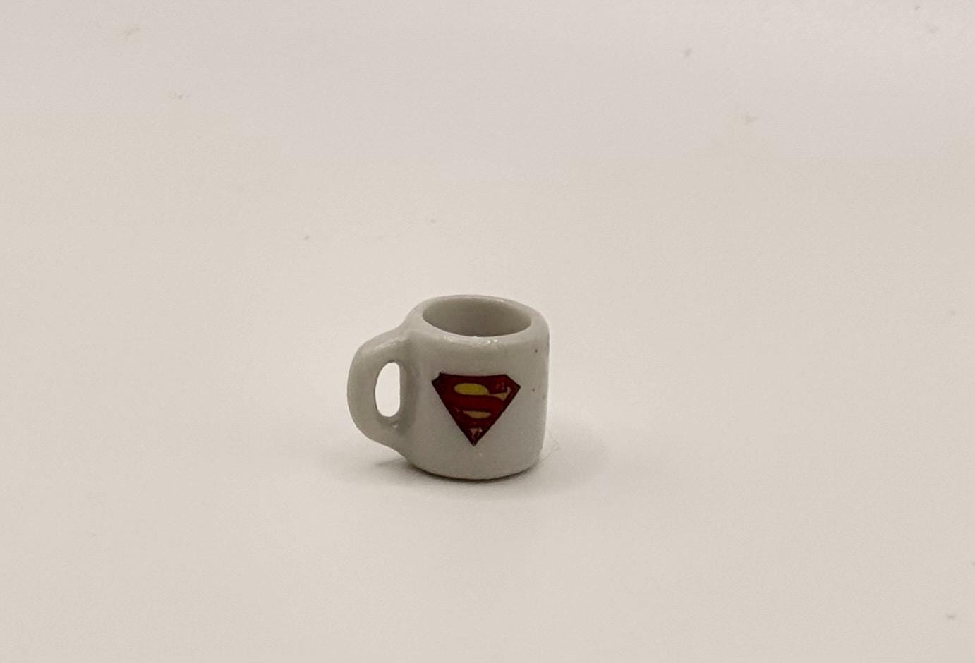Miniature superhero coffee mugs
