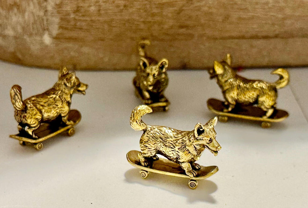 Miniature brass skateboarding Dog figurine