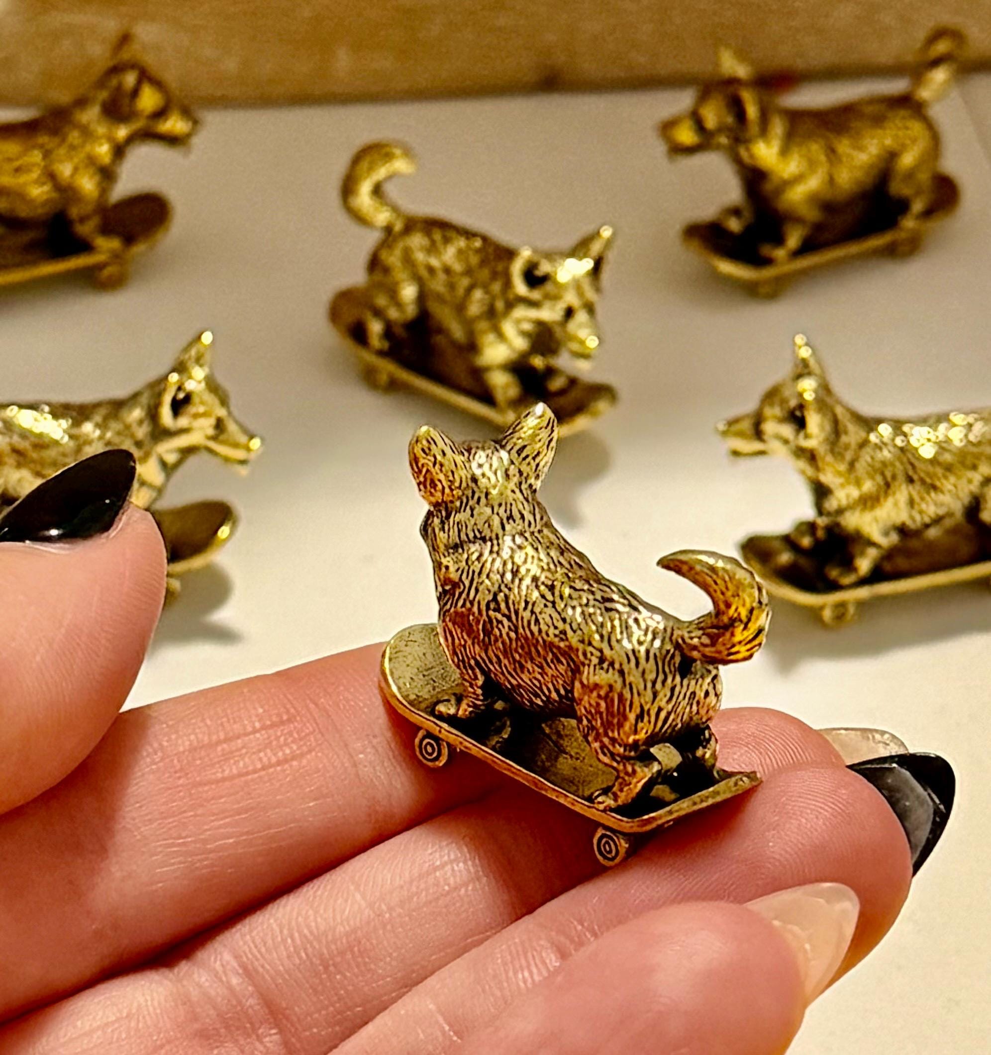 Miniature brass skateboarding Dog figurine