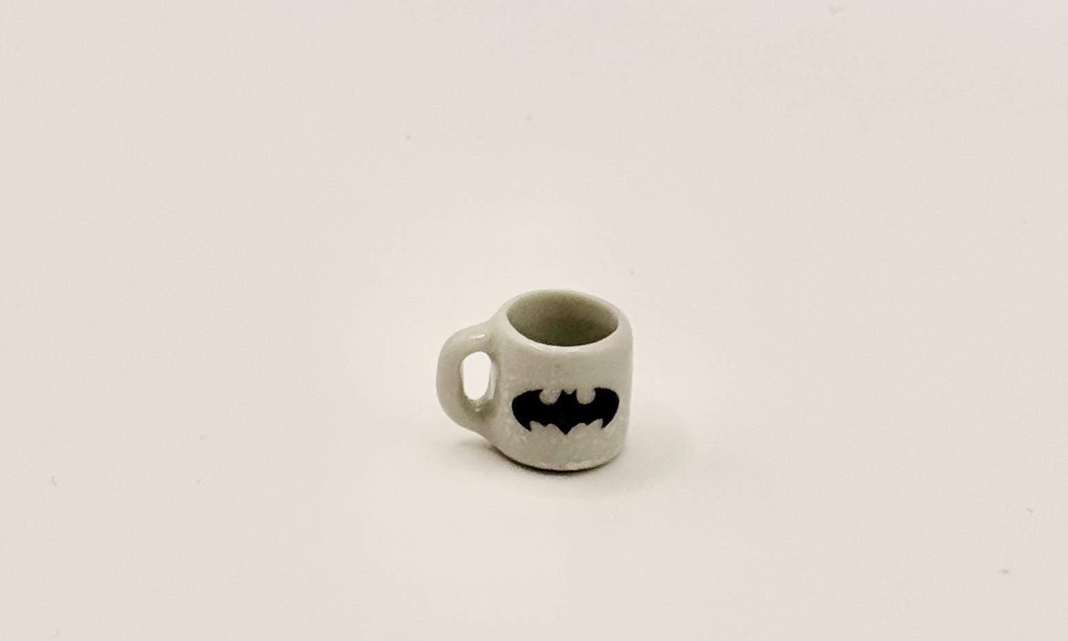 Miniature superhero coffee mugs