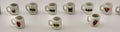 Miniature superhero coffee mugs