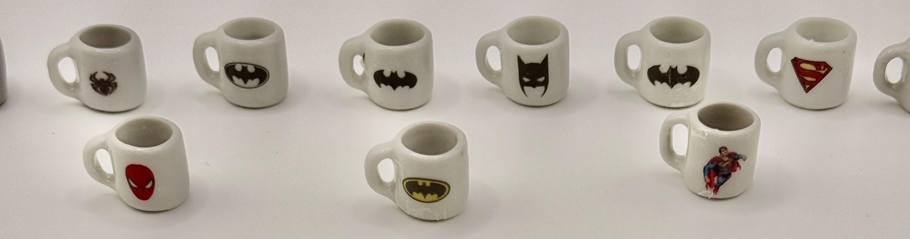 Miniature superhero coffee mugs
