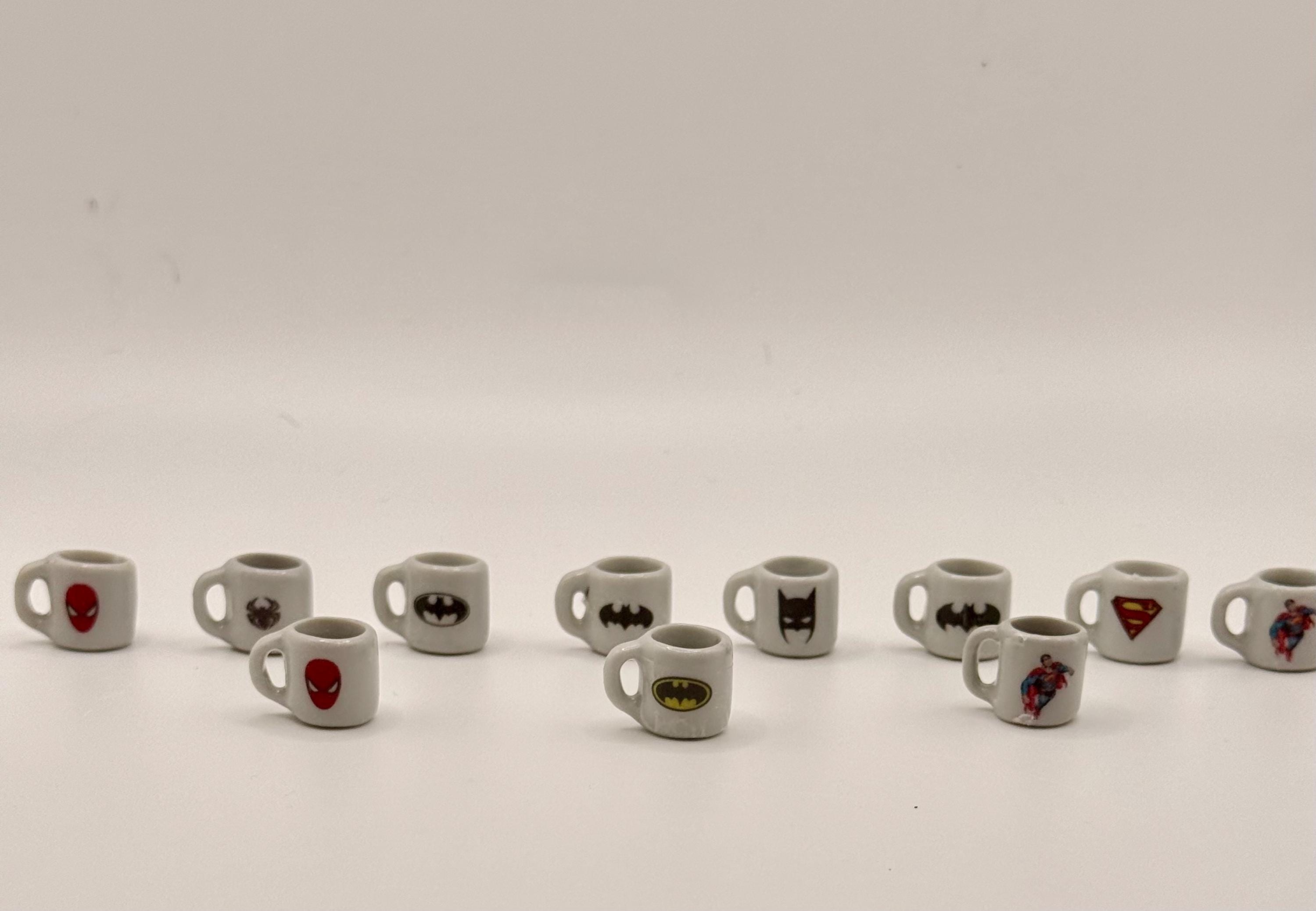 Miniature superhero coffee mugs