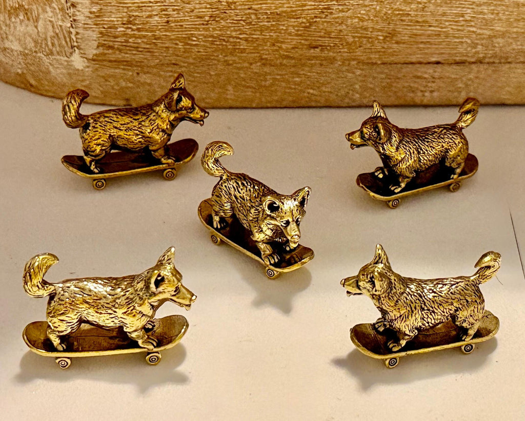 Miniature brass skateboarding Dog figurine