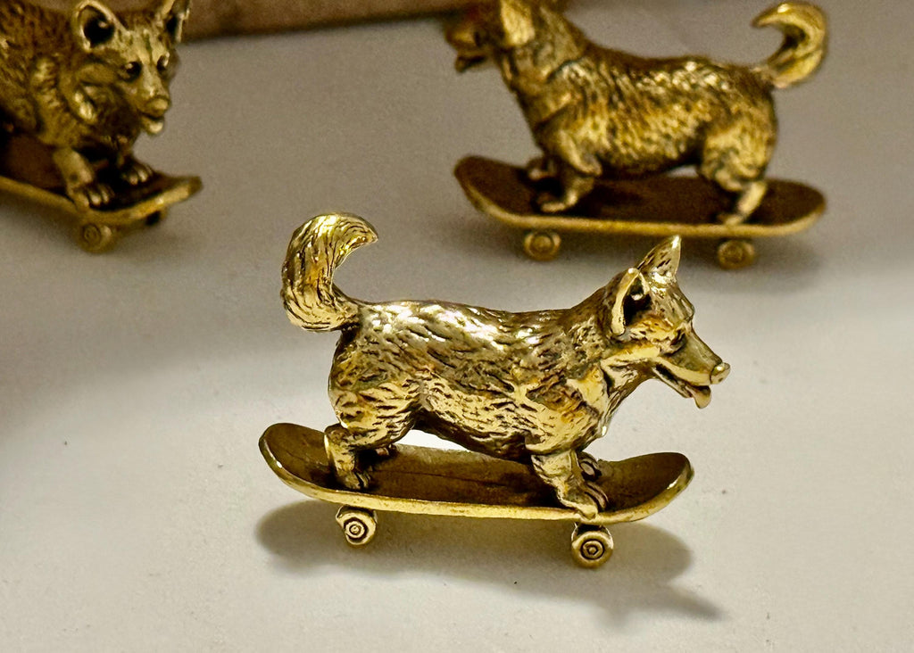 Miniature brass skateboarding Dog figurine
